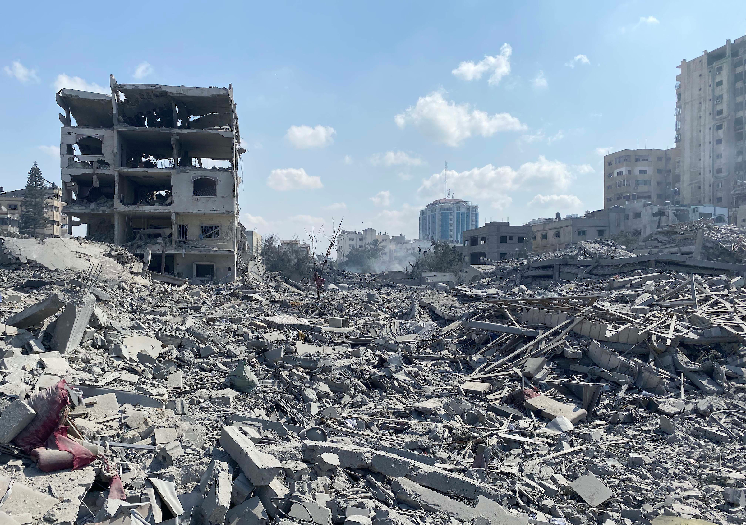 Damaged buildings and rubble in the Rimal district of Gaza City, October 2023